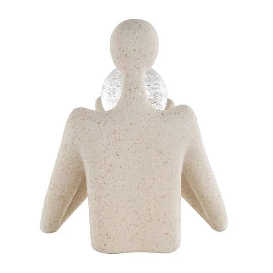 12.75" Cream People Abstract Textured Polystone Sculpture with Clear Glass Ball & Gold Speckles